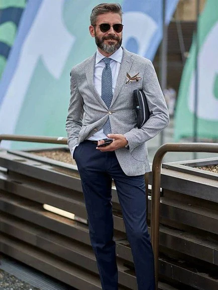 Grey blazer with navy trousers